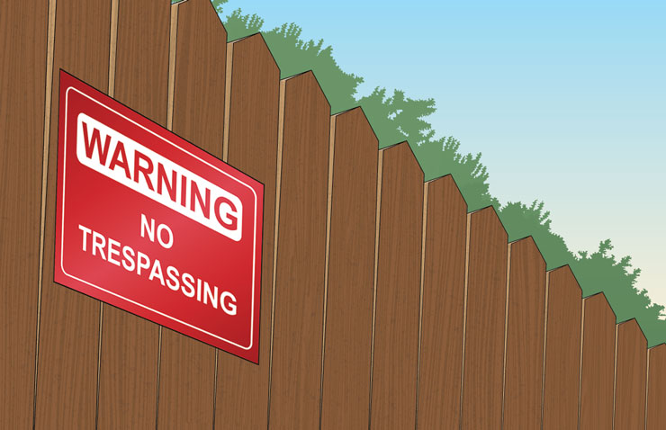 No trespassing sign on fence