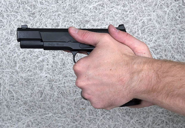 Two-handed handgun grip